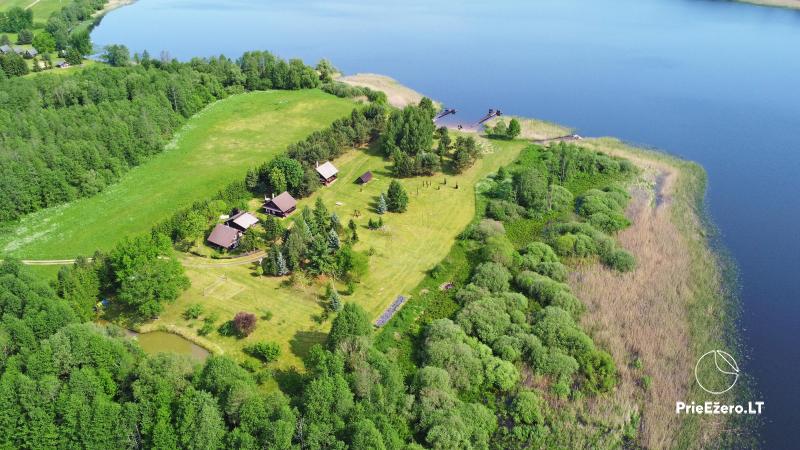 Homestead on the shore of the lake Sartai in Zarasai district Lapėnų Sodyba – log houses, hot tubs, sauna