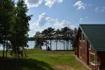 Countryside homestead on the shore of the lake Vencavas