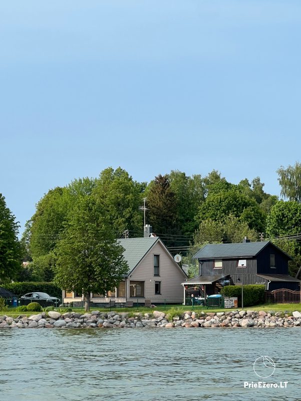 House with sauna and hot tub Poilsis Pas Micką on the shore of Lake Vištytis