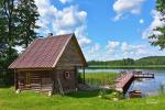 Kayaks, part of a house, campsite at the lake in Ignalina dsitrict