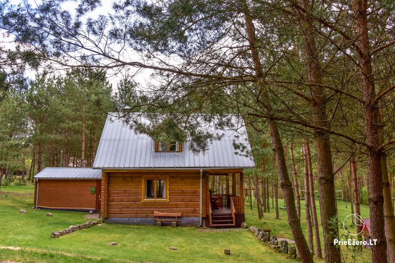 Holiday villas and bathhouse in a homestead Žemuogynė in Moletai district at the lake