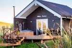 Milkes Karibik - Kleines Haus mit Sauna und großer Außenbadewanne zu vermieten