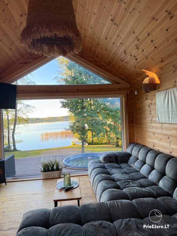 Two 50 sq m. holiday cottages on the shore of the lake in Varena district Jack namai