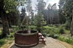Homestead on the lake shore - with a sauna and an outdoor hot tub surrounded by a beautiful forest!