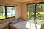 Дом для 2 человек с террасой и видом на озеро. Цена за день за коттедж 60–80 €. - 2